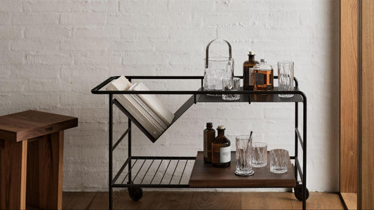 industrial bar cart with glassware and other accessories