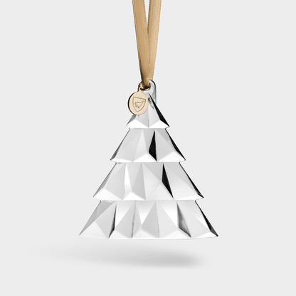 A geometric Christmas tree ornament with a gold ribbon and a tag on a white background
