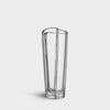 Heart shaped bud vase on a light gray background